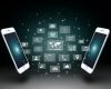 Gérer votre WordPress depuis un téléphone portable Modern communication technology illustration with smartphones interacting and holographic background